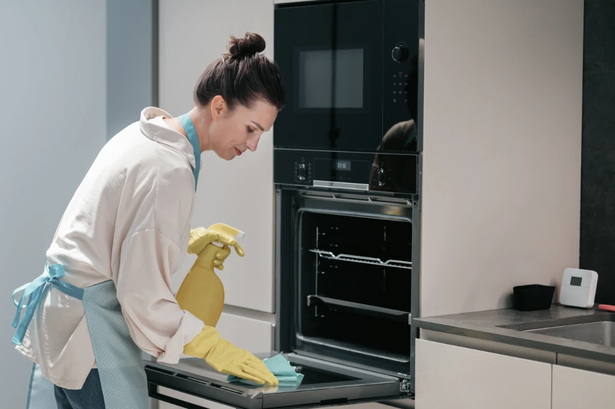 cleaning-kitchen-housewife-yellow-gloves-cleaning-kitchen